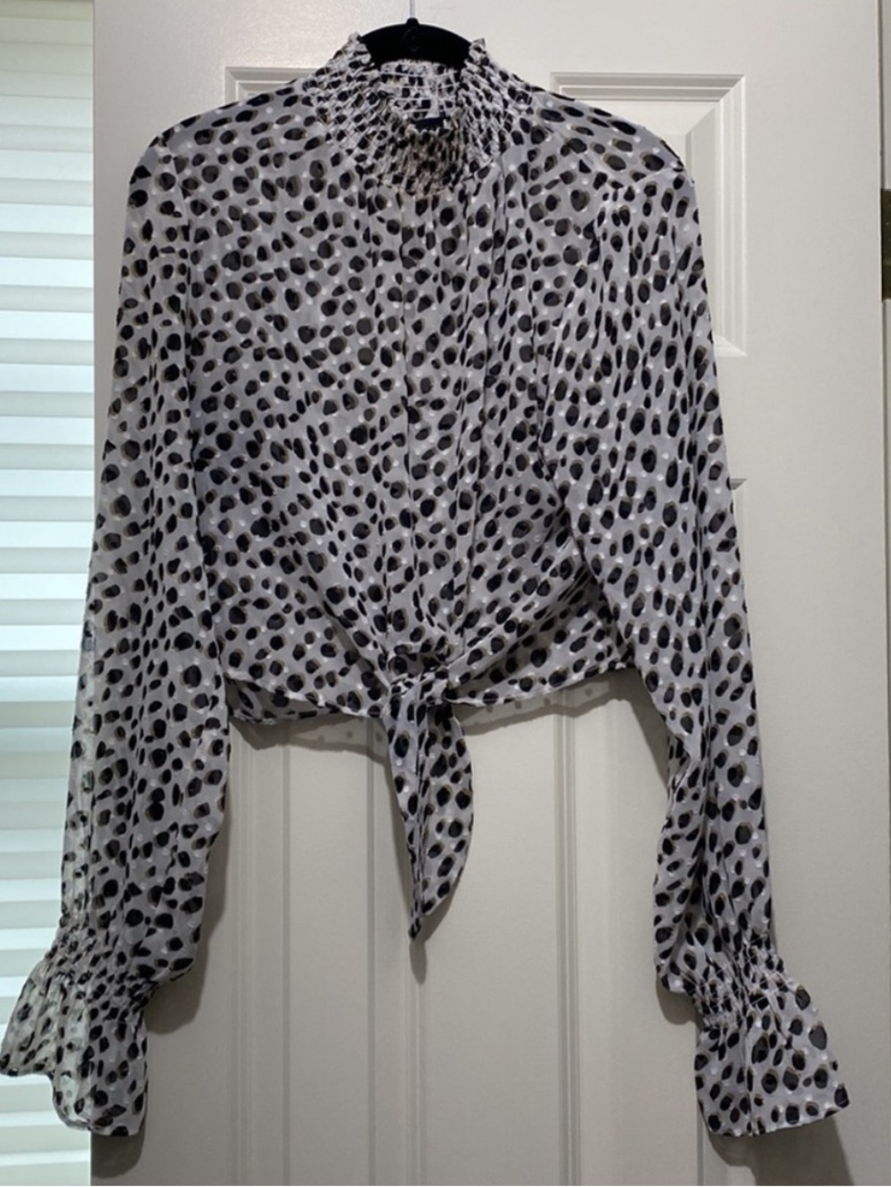 Dance & Marvel White and Black Smocked Neck Tie-Front Animal Print Blouse